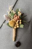 Cute Men's Boutonniere for Autumn Weddings