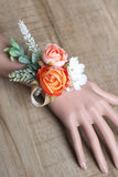 Orange and White Wrist Corsage with Pearls