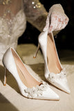 Elegant White Pointed Toe Bridal Shoes with Applique