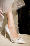 Elegant White Pointed Toe Bridal Shoes with Applique